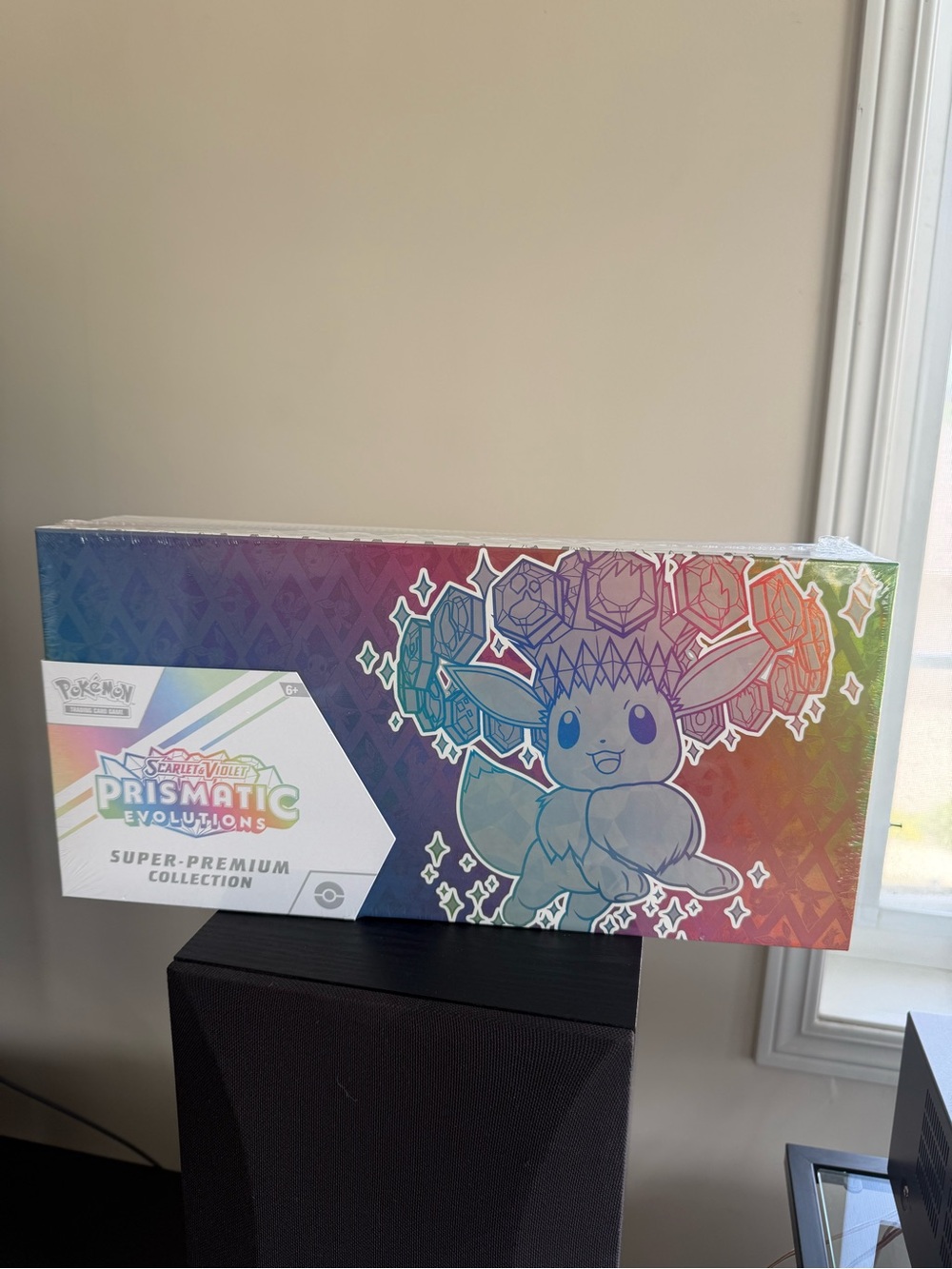 Pokemon Prismatic Evolutions Super-Premium Collection - Rainbow Holographic Box